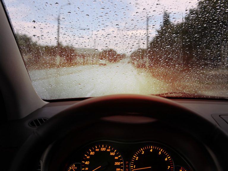 raindrops on windshield impedes vision